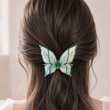 A brown wavy hair accessory with a butterfly design, featuring green and white patterned wings, pinned to the back of a woman's hair.